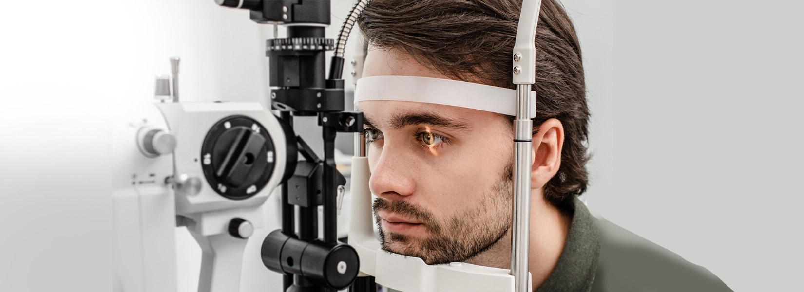 young man during eye exam in Dallas